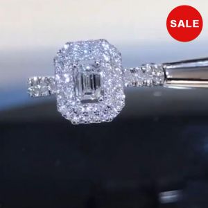 Emerald Cut White Halo Engagement Ring